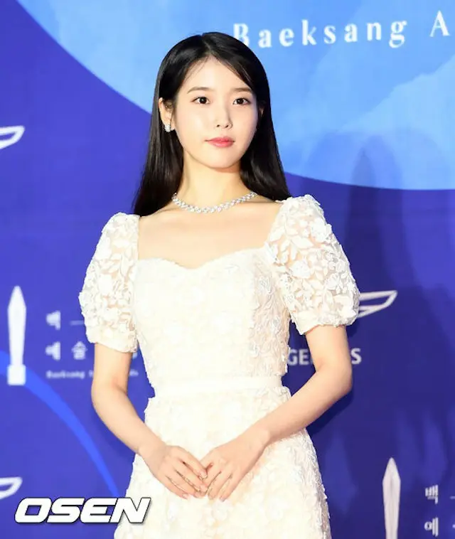 IU、祖孫家庭の子どもたちにクリスマスプレゼント、「緑の傘子ども財団」を通じて1億ウォンを寄付（提供:OSEN）