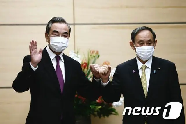 王毅外相訪日、菅首相と20分間会談「日中安定した関係が重要」＝韓国報道（画像提供:wowkorea）