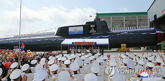 北朝鮮の朝鮮中央通信が報じた戦術核攻撃潜水艦の進水式＝（朝鮮中央通信＝聯合ニュース）≪転載・転用禁止≫