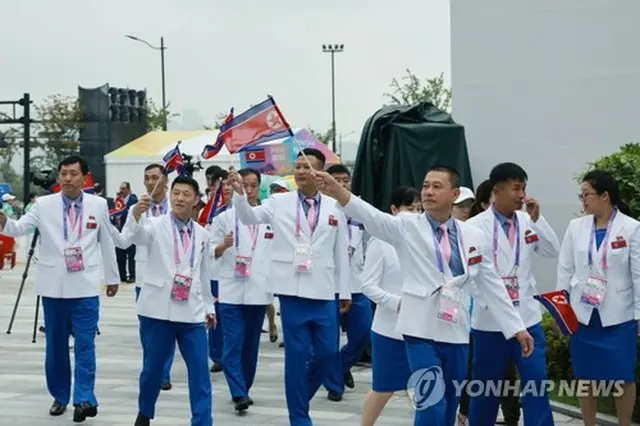 選手村の入村式に参加した北朝鮮選手団＝２２日、杭州（聯合ニュース）