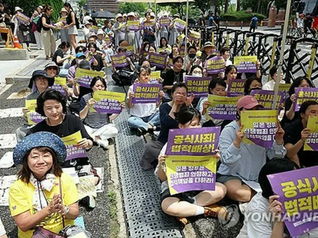 ７月２４日の水曜集会の様子＝（聯合ニュース）