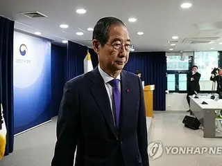 弾劾可決の韓国首相「国会の決定を尊重」　職務停止を受け入れ